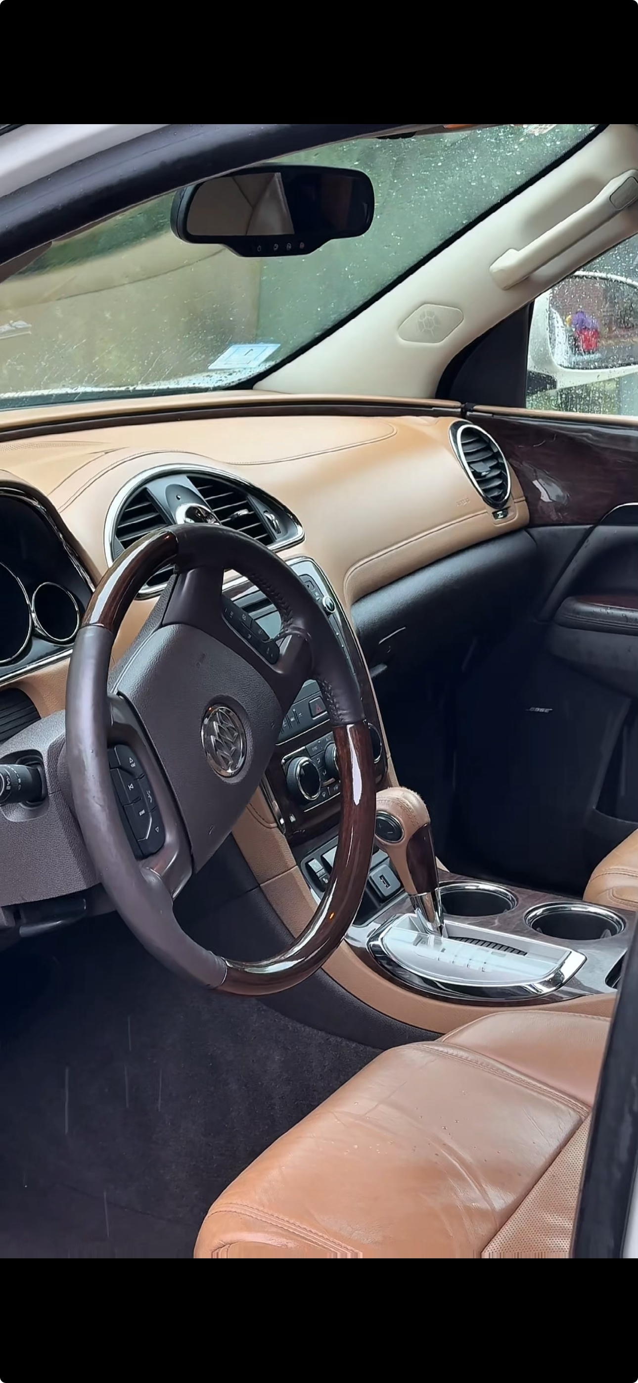 High-end interior detailing - tan leather seats and wood trim Worcester MA